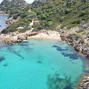  Aparthotel In With Swimming Pool In Cala Girgolu